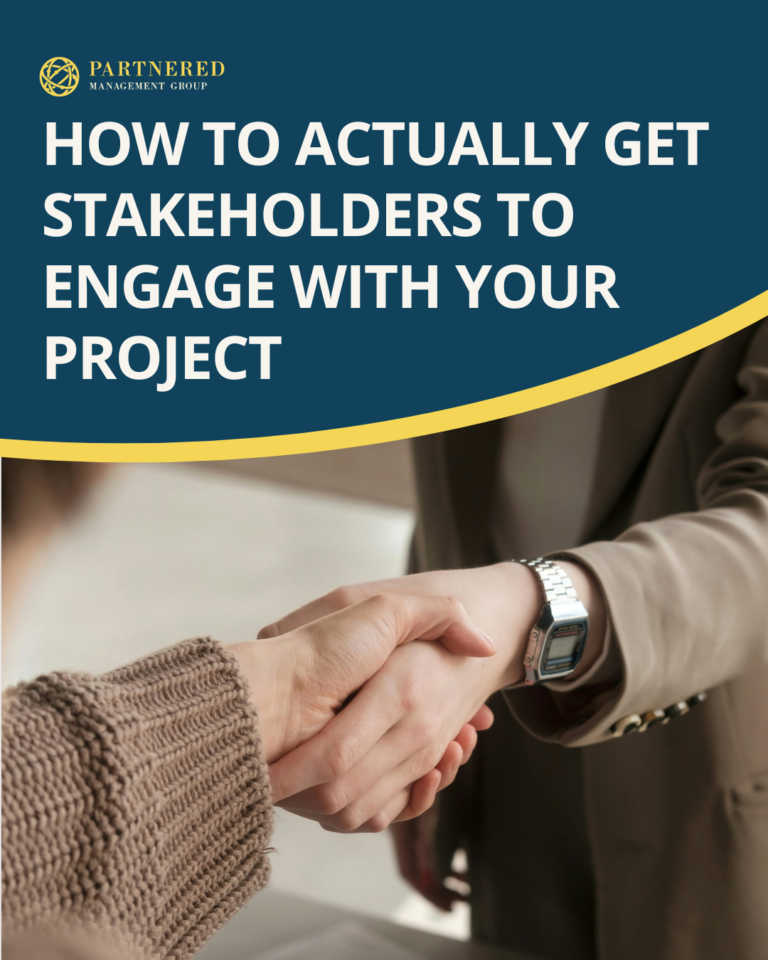 Business professionals shaking hands, representing stakeholder engagement in project management success
